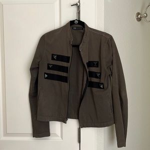 Green JET jacket with black stud detailing